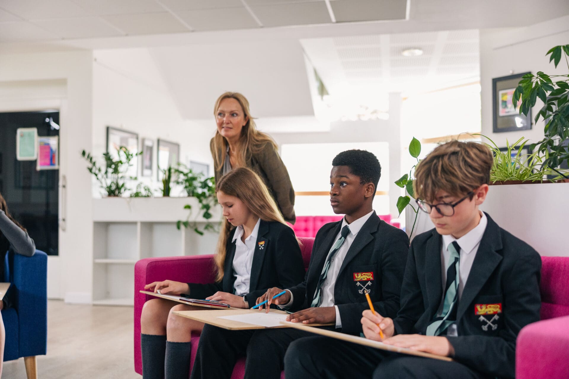 Image of 3 pupils in an art class