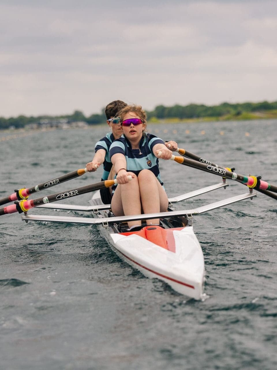 Image of 2 pupils rowing