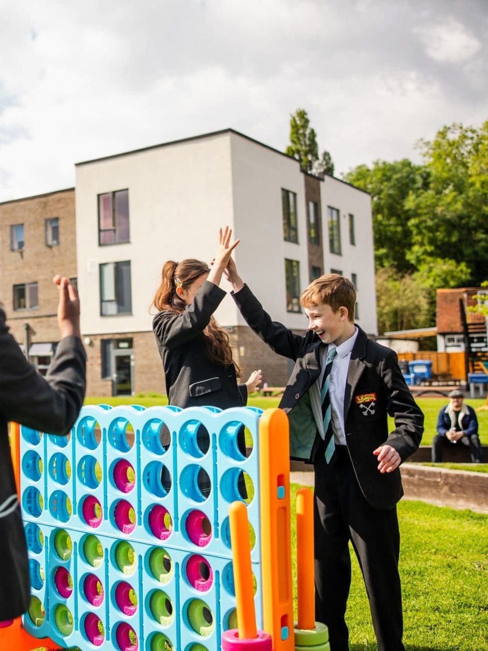 Image of 2 pupils playing giant connect 4