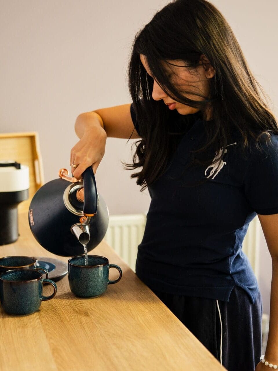 Image of a boarding pupil making a cup of tea