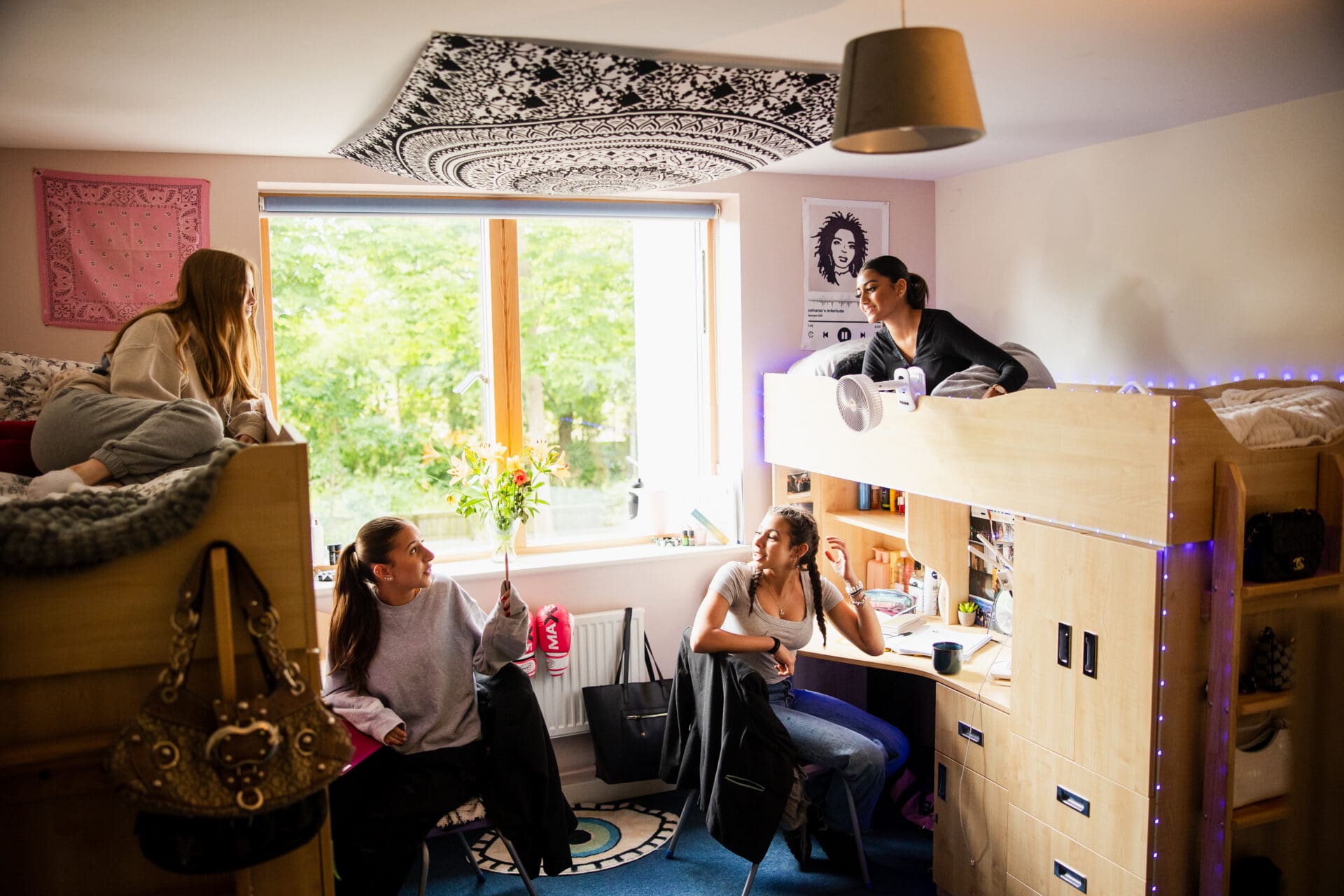 Image of female pupils in their boarding house dorm room