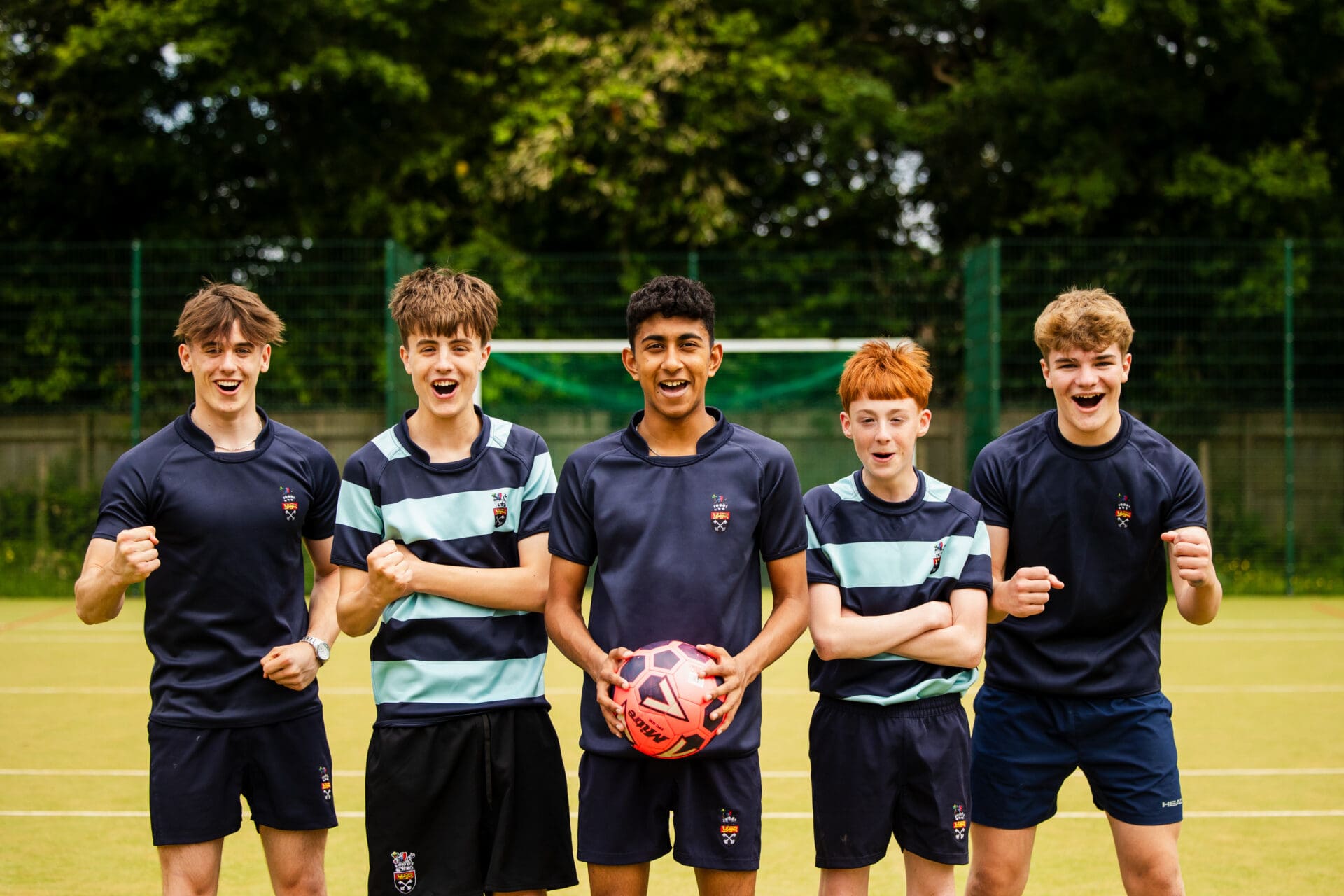 Image of 5 sixth form pupils on the football field